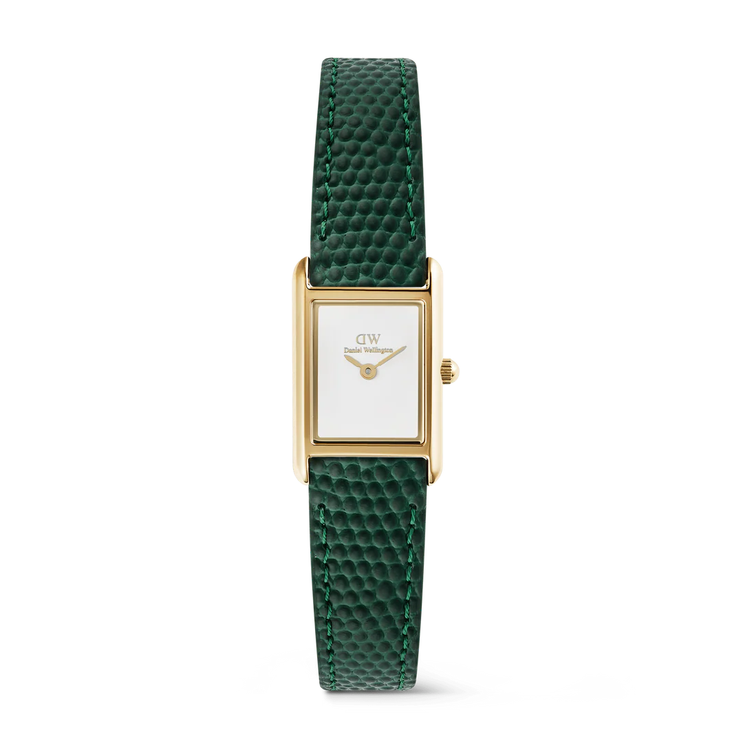 Die Bound Mini Daniel Wellington Damenuhr, ist eine elegante Uhr mit einem gr&uuml;nen Armband und einem Geh&auml;use aus Edelstahl. Sie hat keine Datumsfunktion und ist neu. Perfekt f&uuml;r das t&auml;gliche Tragen am Handgelenk, eignet sie sich idealerweise f&uuml;r Anl&auml;sse, bei denen Eleganz und Schlichtheit gefragt sind.