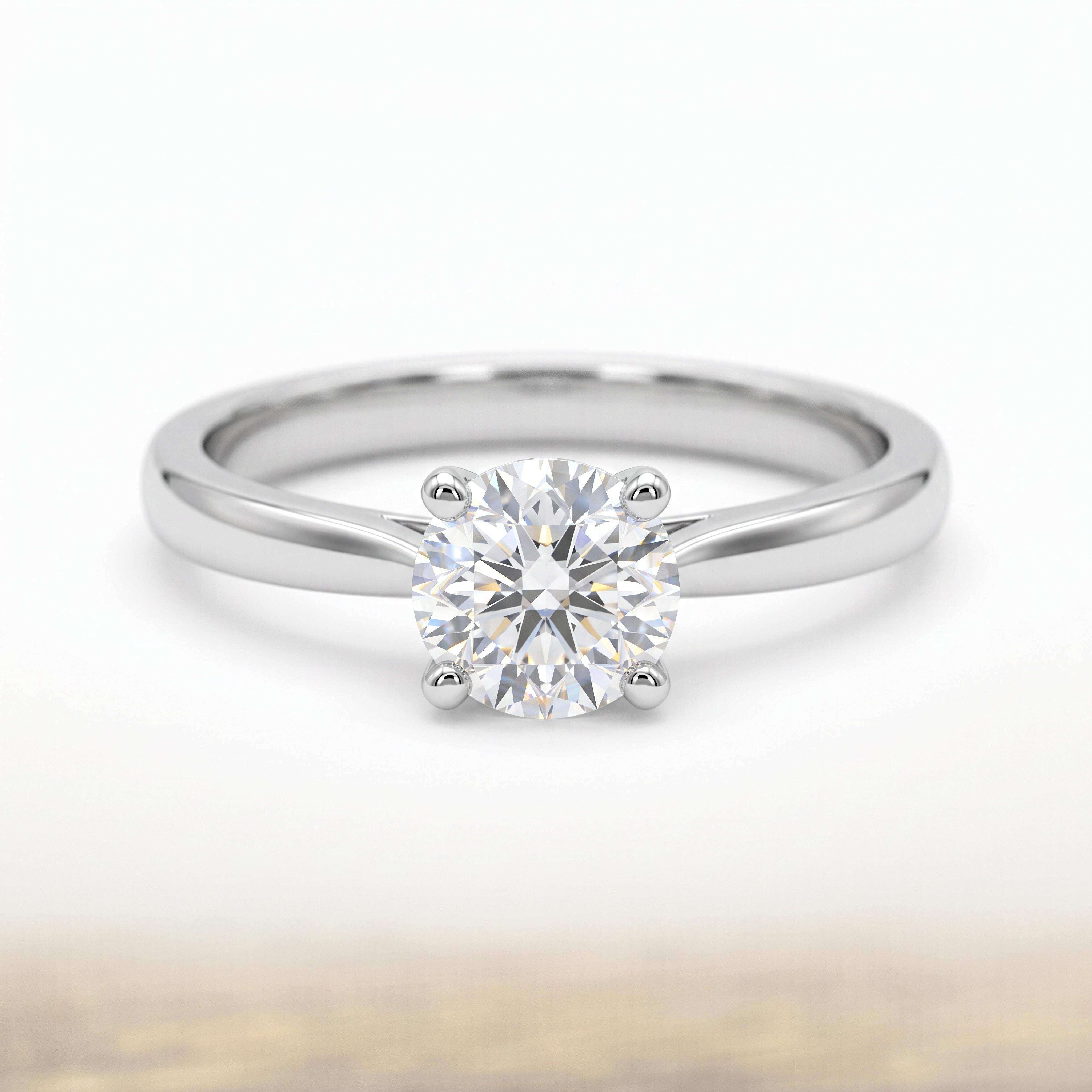 De Ultieme Klassieker: 14 Karaat Witgouden Solitaire Ring met 0.50ct D-Kleur Diamant (GIA)
Op zoek naar de perfecte, tijdloze witgouden solitaire verlovingsring van de allerhoogste klasse? Deze adembenemende 14 karaat witgouden ring van Juwelier Rijk Amsterdam is bezet met een schitterende 0.50 caraat natuurlijke briljant.

De steen heeft de kleur D (het allerhoogste niveau van zeldzaam wit) gecombineerd met de zuiverheid SI, wat zorgt voor een onge&euml;venaarde schittering en ultieme helderheid. Gezet in een verfijnde 4-kraps zetting op een slanke, vloeiende band, komt alle aandacht volledig op de steen te liggen. Bovendien wordt de ring geleverd met een officieel internationaal erkend GIA-certificaat, uw garantie voor authenticiteit en topkwaliteit.

Duurzaam & Massief: Gemaakt voor een Leven Lang
Vervaardigd uit hoogwaardig massief 14 karaat witgoud (585). De doordachte 4-poot slanke zetting laat het licht optimaal van alle kanten door de diamant stromen, terwijl het massieve ontwerp stevig genoeg is voor dagelijks gebruik.