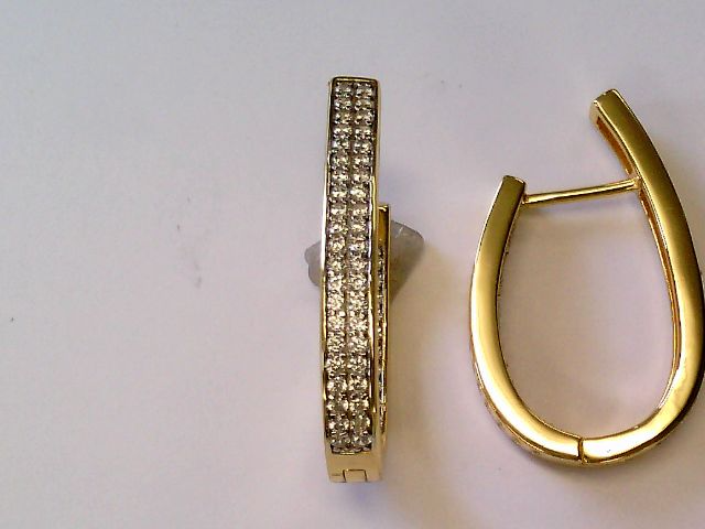Die Creolen 925 gelb Zirkonia goldplatt., Modellnummer 5-216470-001, sind elegante Ohrringe aus Sterling Silber mit goldplattierter Oberfl&auml;che und funkelnden Zirkonia-Steinen. Perfekt f&uuml;r festliche Anl&auml;sse oder einen eleganten Alltagslook. Tragen Sie diese Creolen mit hochgestecktem Haar, um ihren Glanz und die Details voll zur Geltung zu bringen.
