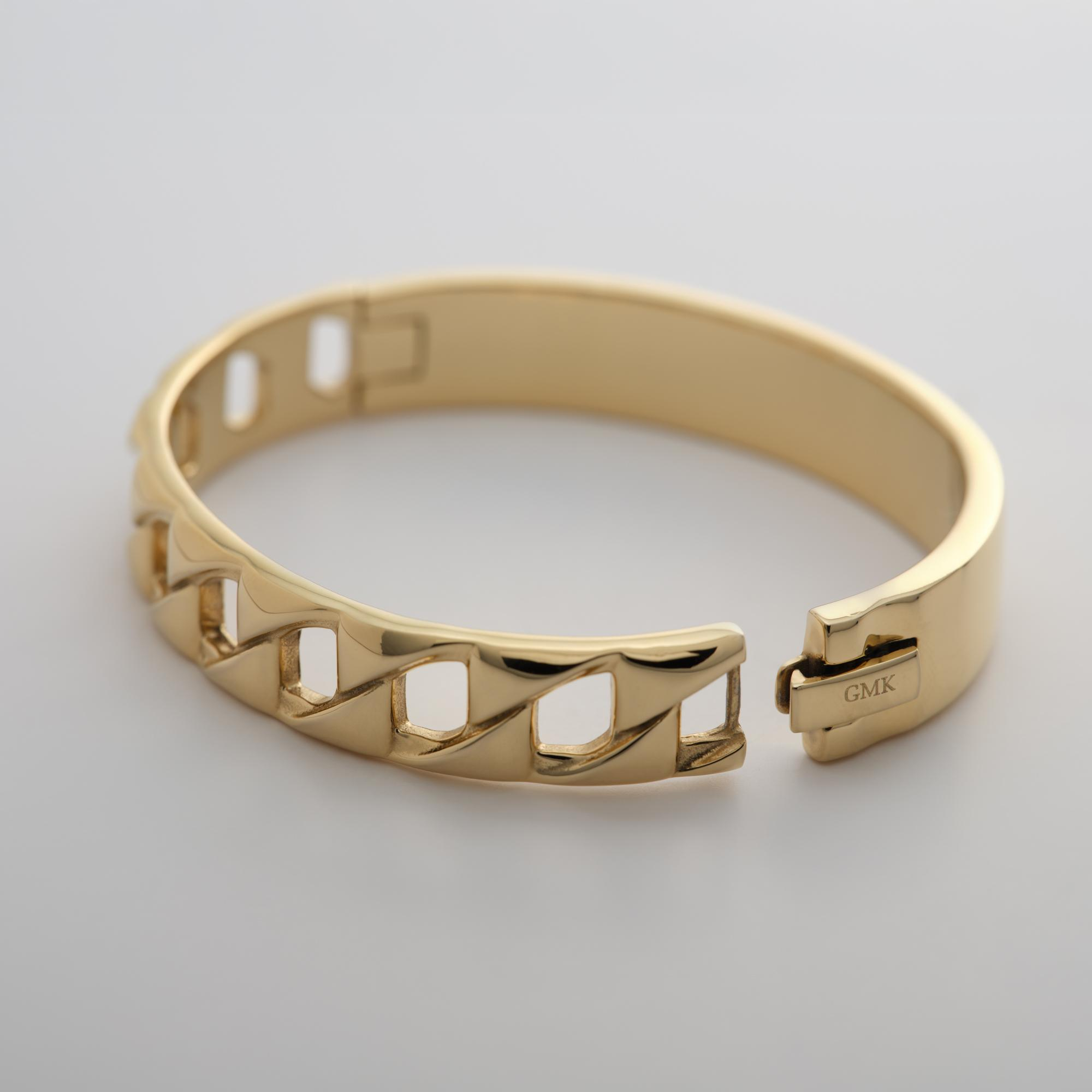 Der Guido Maria Kretschmer Armreif, ein neues Schmuckst&uuml;ck, beeindruckt als elegantes Armband. Kategorie: Schmuck. Ideal f&uuml;r den t&auml;glichen oder besonderen Anlass. Am besten in Kombination mit anderen eleganten Accessoires tragen oder allein f&uuml;r ein minimalistisches Statement. Perfekt, um jedem Outfit Raffinesse zu verleihen.