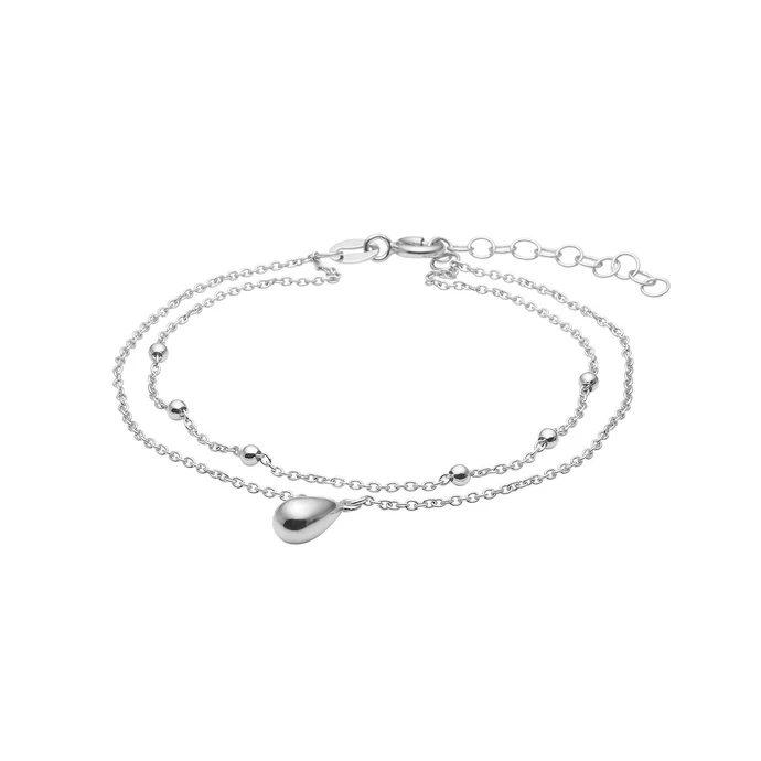 Das Rhd. Silber Armband DROPS52, ist ein elegantes Tennisarmband aus der Kategorie Schmuck. Es ist neu und aus hochwertigem Silber gefertigt. Tragen Sie es allein f&uuml;r einen klassischen Look oder kombinieren Sie es mit anderen Armb&auml;ndern f&uuml;r einen trendigen Layering-Stil. Perfekt f&uuml;r besondere Anl&auml;sse oder den t&auml;glichen Gebrauch.