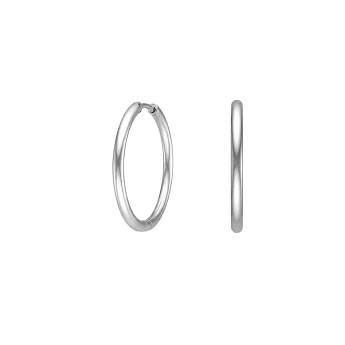 Entdecken Sie die eleganten Stahl Creolen 21mm . Diese neuen Ohrringe aus unserer Schmuckkollektion zeichnen sich durch ihr klares Design und hochwertige Verarbeitung aus. Perfekt f&uuml;r den t&auml;glichen Gebrauch oder besondere Anl&auml;sse, lassen sie sich ideal mit klassischen oder modernen Outfits kombinieren und verleihen jedem Look einen eleganten Touch.