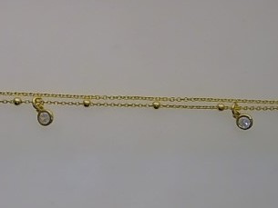 Das Armband Silber GP Zirkonia 17+2cm, Modellnummer 26-413, ist ein elegantes Schmuckst&uuml;ck aus 925 Sterling Silber mit einer Goldbeschichtung. Es ist mit drei Zirkonia-Steinen verziert. Die Gesamtl&auml;nge betr&auml;gt 19 cm inklusive Verl&auml;ngerung. Dieses Armband l&auml;sst sich perfekt mit Abendgarderobe kombinieren und verleiht jedem Outfit einen Hauch von Eleganz.