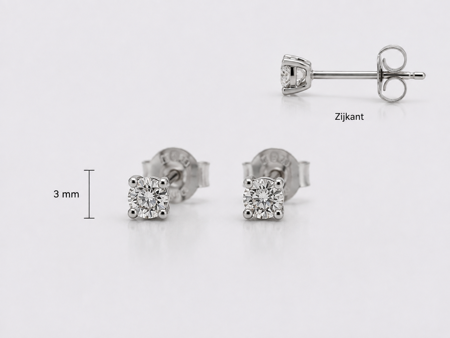 Witgouden oorstekers met chaton zetting. 0.20 ct briljant