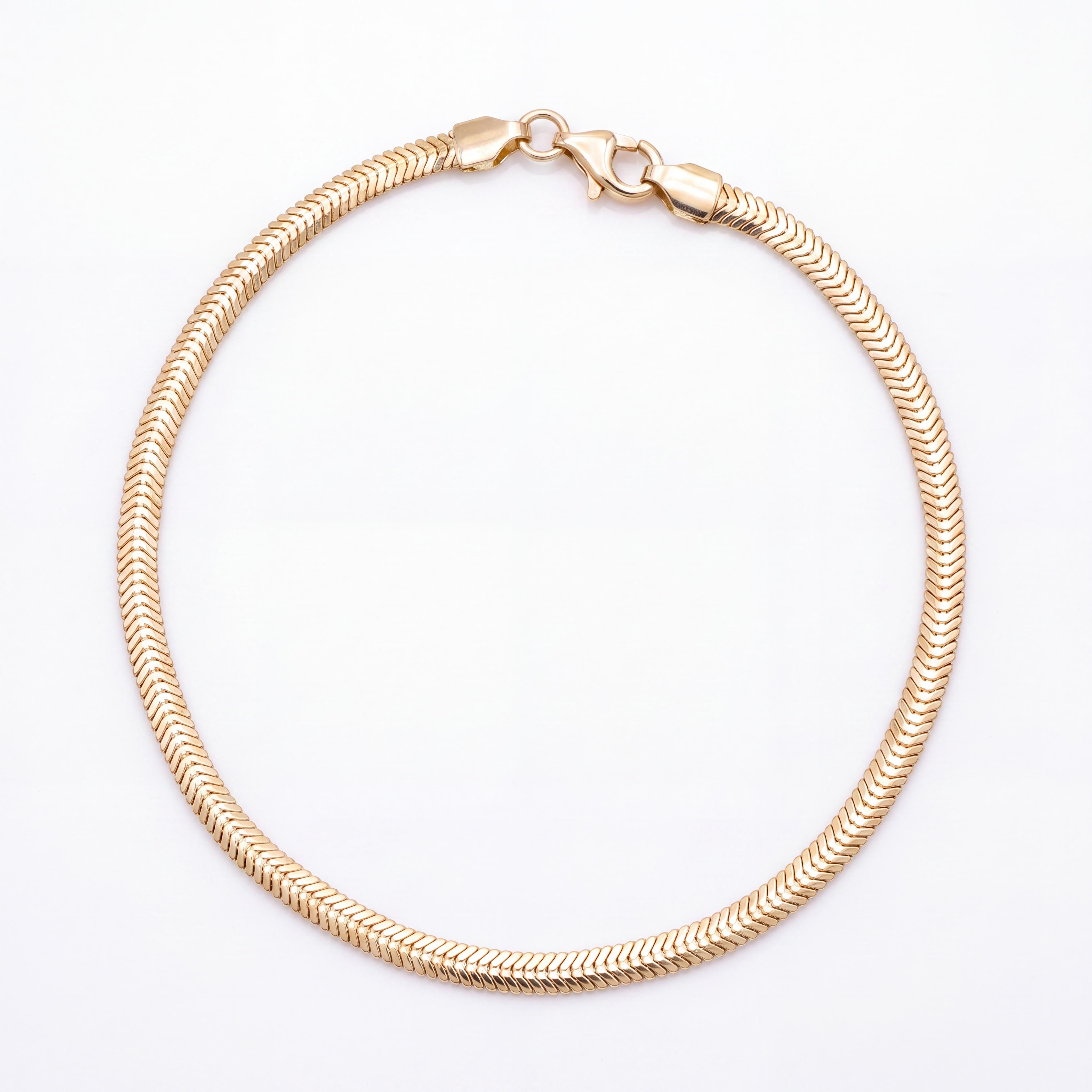 De 14K Gouden Visgraat Herringbone Armband is een verfijnde armband van 14-karaats goud. Met een lengte van 20 cm, een breedte van 9 mm en een gewicht van 5.26 gram, straalt deze gouden armband elegantie uit. Perfect voor dagelijks gebruik of speciale gelegenheden. Combineer het met andere gouden sieraden voor een complete look.