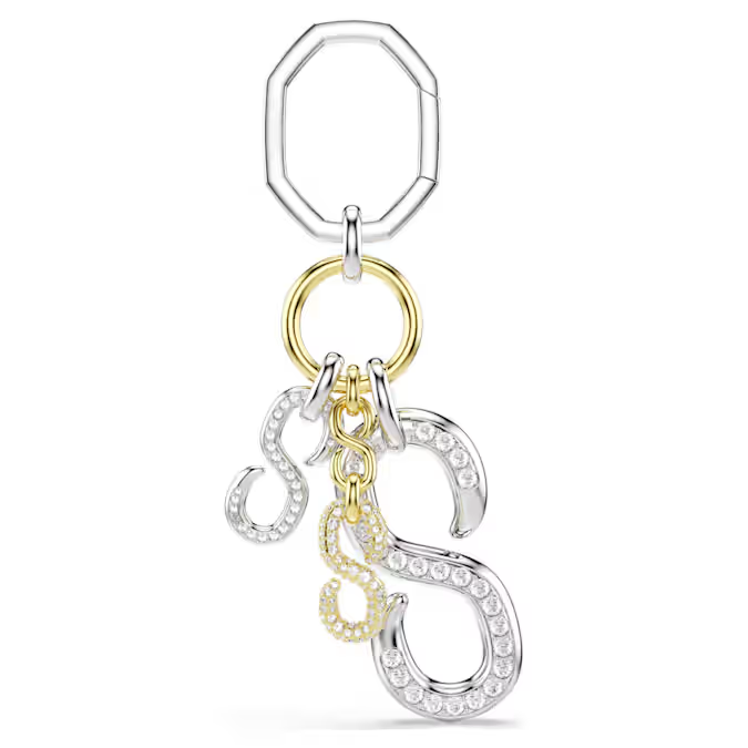 Deze tassenhanger is ge&iuml;nspireerd op de kenmerkende colliers van de Dextera-sieradenlijn en heeft drie krachtige S-elementen die symbool staan voor Swarovski. Het ontwerp combineert pav&eacute;-accenten met een toplaag van verschillende metalen voor een dynamisch, bungelend effect en een briljante persoonlijke touch. Dankzij de sluiting met dubbele ring kunt u hem op twee manieren stylen, waardoor u hem veelzijdig kunt aanpassen aan sleutels, tassen, buidels of clutches.

Artikelnr.: 5763019
Ge&iuml;nspireerd door collectie:  Dextera
Formaat: 11.2 x 2.8 cm
Materiaal:  Kristallen, Gemengde metalen afwerking
Kleur:  Wit
Type sluiting:  Octagon-sluiting
