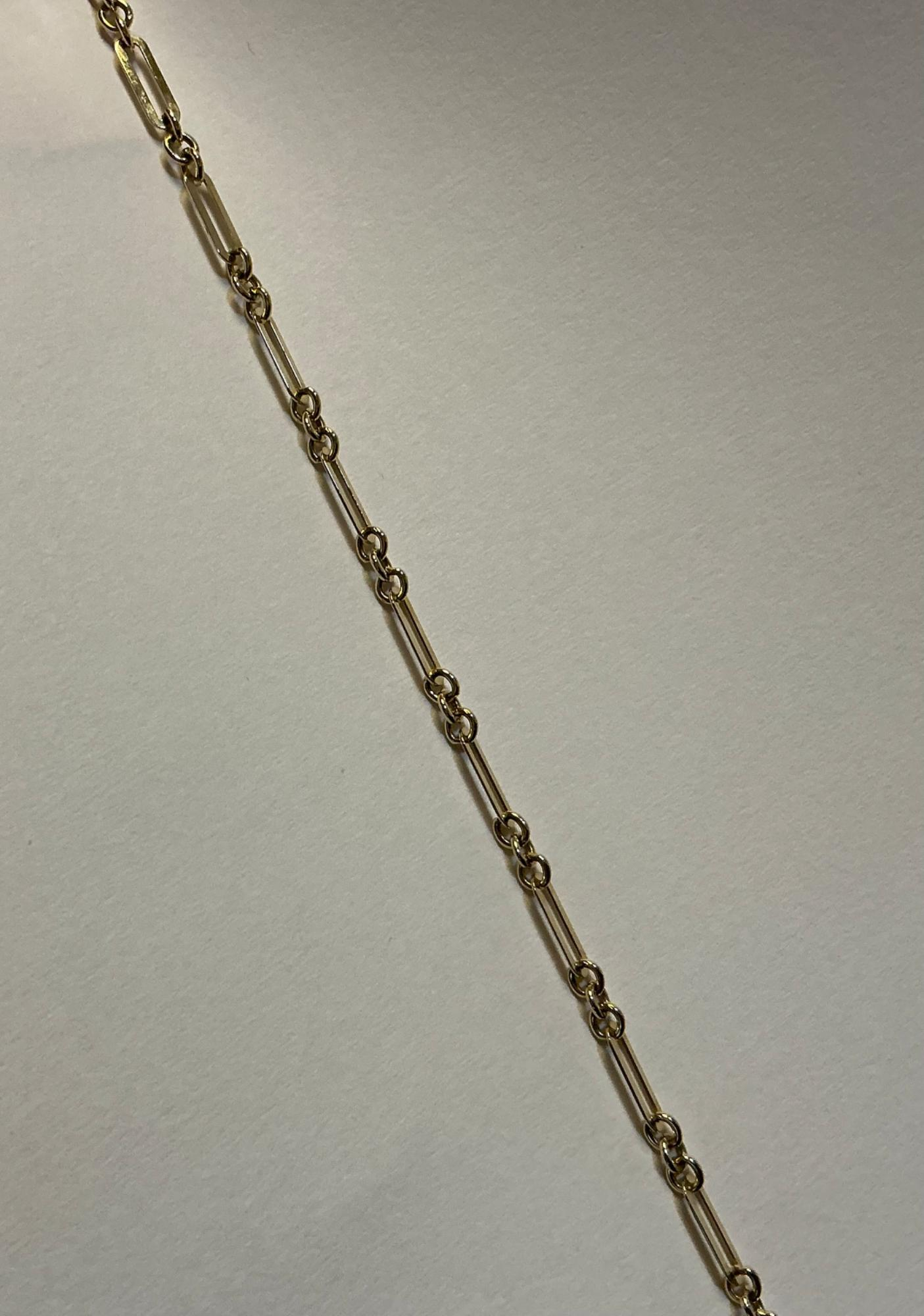Gouden Joy & Julia armband, paperclip schakel met tussenogen.
Lengte: 18.5 - 19.5 cm
Breedte: 2.6 mm