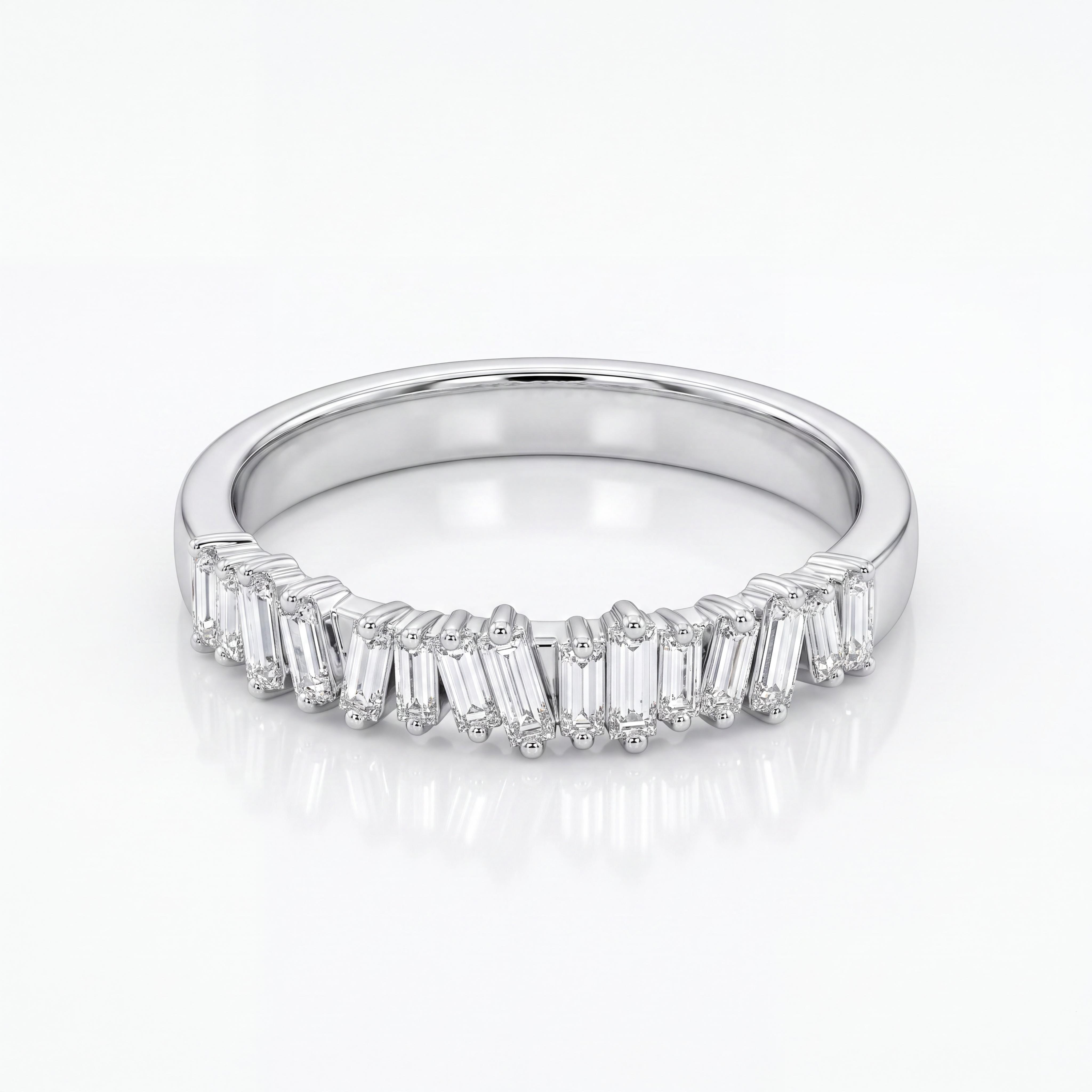 Moderne 14 karaat witgouden chevron verlovingsring uit de eigen collectie van Juwelier Rijk in Amsterdam. De ring is halfom bezet met baguette geslepen diamanten (SI1/G) in een unieke zigzagzetting. Perfect als stijlvolle aanschuifring of verlovingsring. Te bezichtigen aan de Heiligeweg 10 in het centrum van Amsterdam.