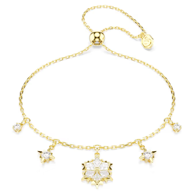 Deze armband legt de Swarovski-sneeuwvlok beeldschoon vast in een briljant gefacetteerde stijl. Het ontwerp is versierd met heldere Swarovski Zirkonia, die vijf winterse motieven vormen op een delicate ketting met een verstelbare schuifsluiting. Elk artikel uit de Magic Evolution-collectie beheerst de kunst van het stapelen en in laagjes werken tot in de puntjes, met gestileerde vormen die elke look schitterend afwerken

Artikelnr.: 5757800
Collectie:  Magic
Maximale lengte: 24 cm
Formaat motief: 1.4 x 1.1 cm
Materiaal:  18k gouden afwerking, Cubic zirconia
Kleur:  Wit
Type sluiting:  Schuifbare bal