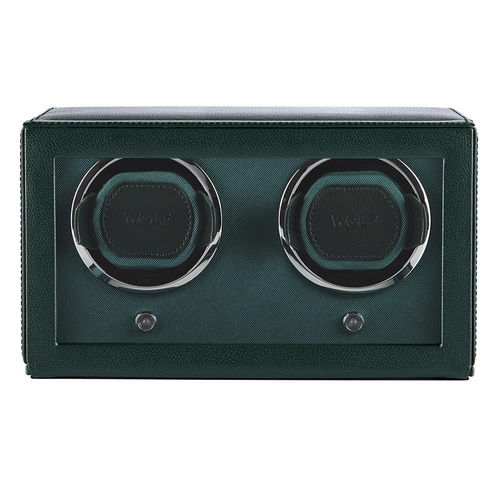 De Wolf1834 Horlogewinder - CUB Double met groene klep (modelnummer 461241) is een accessoire voor het veilig opbergen en opwinden van horloges. Het is gloednieuw en perfect voor horlogeliefhebbers. Plaats eenvoudig uw horloge in de winder om het automatisch op te winden. Ideaal om op een elegante manier uw horloges georganiseerd en gebruiksklaar te houden.