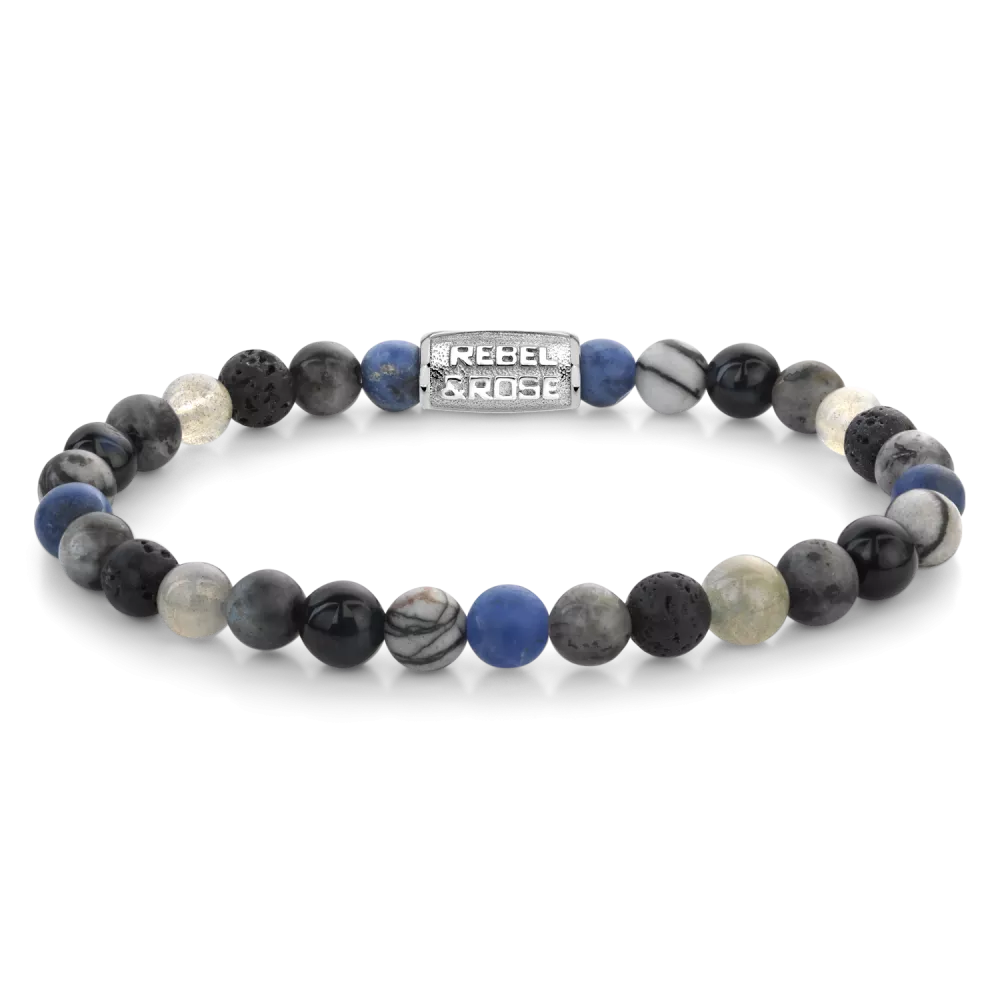 Bead armband, handgemaakt van 6mm Sodaliet Blauw, Agaat (Black Network), Tijgeroog Blauw, Larvakiet Grijs, Labradoriet en Lava stenen met een zilverkleurige sluiting. De Rebel & Rose sieraden zijn makkelijk te combineren met andere zilveren, leren of kralenarmbanden.