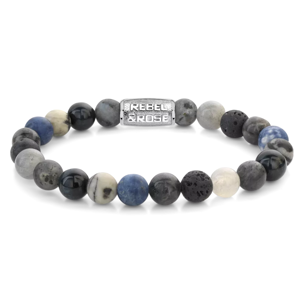 Bead armband, handgemaakt van 8mm Sodaliet Blauw, Agaat (Black Network), Tijgeroog Blauw, Larvakiet Grijs, Labradoriet en Lava stenen met een zilverkleurige sluiting. De Rebel & Rose sieraden zijn makkelijk te combineren met andere zilveren, leren of kralenarmbanden.