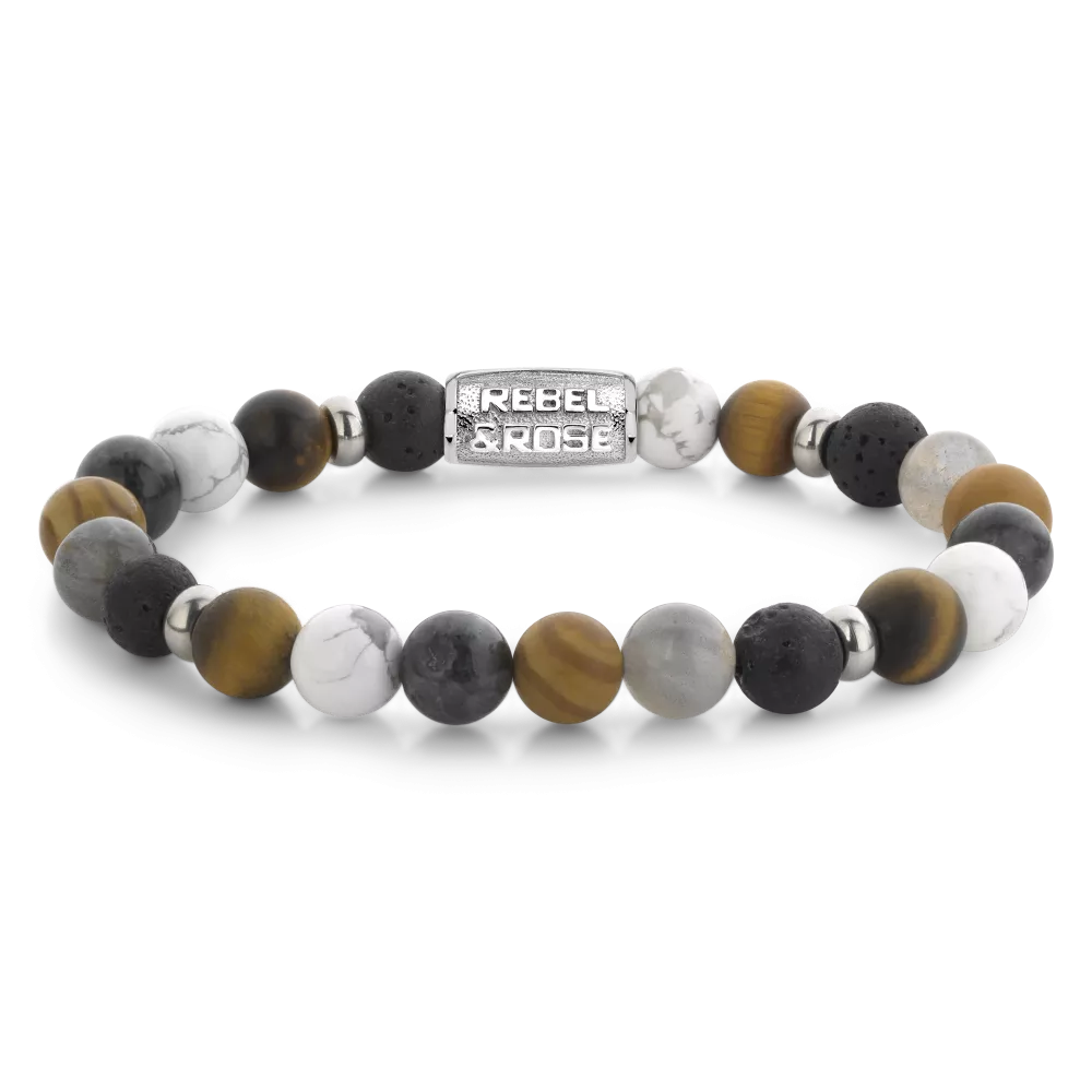 Bead armband, handgemaakt van 8mm stenen (Tijgeroog, Lava, Labradoriet, Grain Stone, Larvakiet, Howliet en kleine Stainless Steel elementen) met een zilverkleurige sluiting. De Rebel & Rose sieraden zijn makkelijk te combineren met andere zilveren, leren of kralenarmbanden.