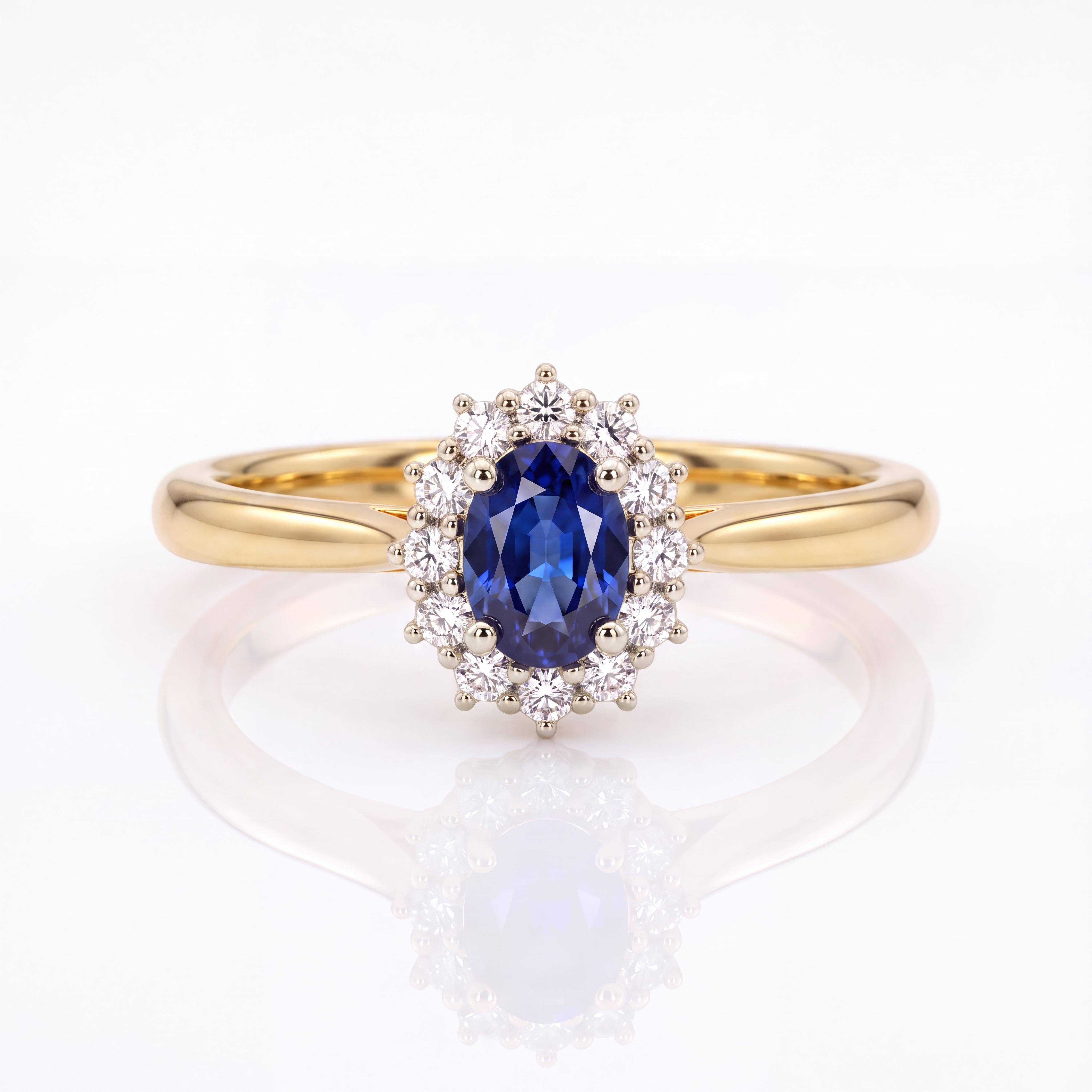 Ervaar koninklijke klasse en tijdloos vakmanschap met deze 18 karaat massief geelgouden entourage ring, verrijkt met een diepblauwe natuurlijke saffier van 0.34 karaat en 0.16 karaat glinsterende diamanten. Verkrijgbaar bij Juwelier Rijk Amsterdam.

Het hart van deze ring gevormd door een ovaal geslepen natuurlijke blauwe saffier met een rijke, intense kleur. Om de saffier optimaal tot zijn recht te laten komen, is de edelsteen gevat in een verfijnde witgouden chaton/zetting. Deze witgouden halo-omranding is bezet met briljant geslepen diamanten (totaal 0.18 ct), wat zorgt voor een prachtig contrast met de warme, massieve 18 karaat geelgouden band (750).