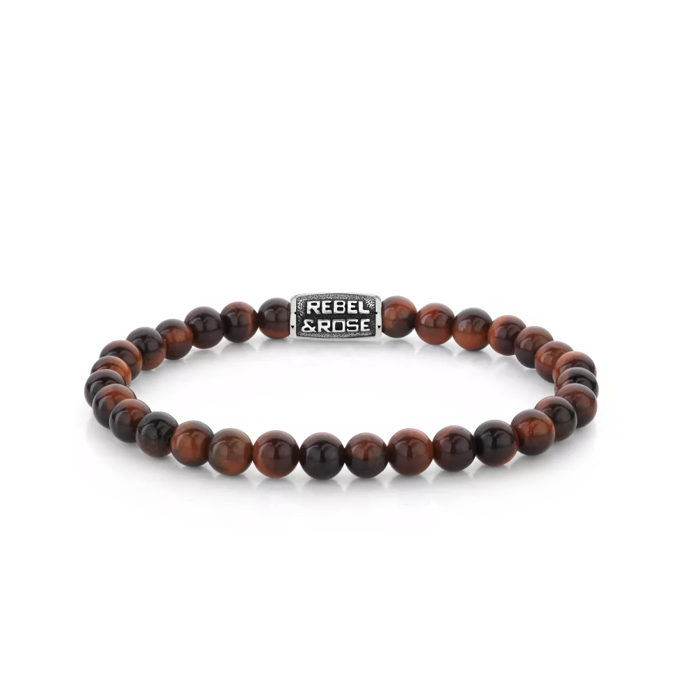Bead armband, handgemaakt van 6mm Rode Tijgeroog stenen met een edelstalen sluiting. De Vintage look van de sluiting is met de hand aangebracht. Het Rebel & Rose sieraad is makkelijk te combineren met andere zilveren, leren of kralenarmbanden.