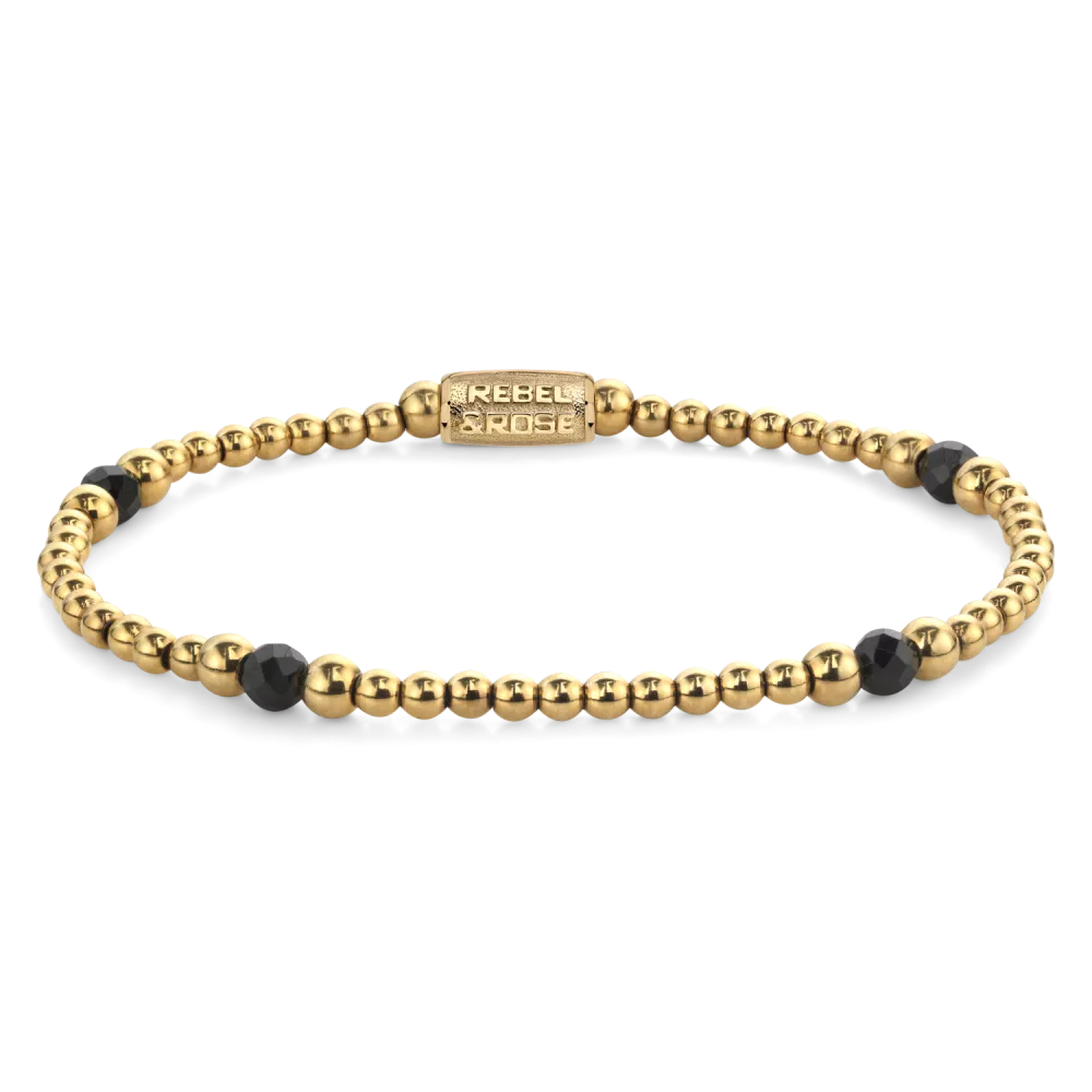Bead armband, handgemaakt van 4mm Black Spinel gefaceteerde kralen, afgewisseld met 3mm en 4mm 18 karaat goud ion-plated edelstalen stenen. De sluiting is gemaakt van 18 karaat goud ion-plated edelstalen. Het Rebel & Rose sieraad is makkelijk te combineren met onze andere kralenarmbanden.
