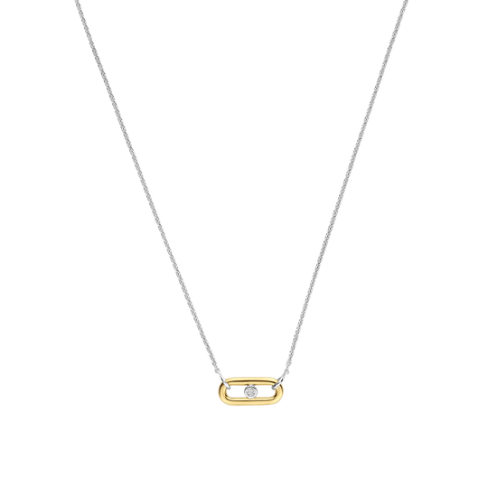 Deze verfijnde TI SENTO ketting combineert een modern schakelontwerp met subtiele sprankeling. De ketting is vervaardigd uit hoogwaardige kwaliteit 925 sterling zilver en heeft een fijn zilveren kettinkje. Als hanger dient een open, goudkleurig vergulde schakel met in het midden een rond zirkonia steentje, wat het ontwerp een elegante en eigentijdse uitstraling geeft. Draag deze zilveren ketting met goudkleurig vergulde schakel en zirkonia solo voor een verfijnde look of combineer hem met andere kettingen voor een gelaagde styling. Het minimalistische ontwerp past moeiteloos bij zowel een dagelijkse outfit als een meer geklede gelegenheid.