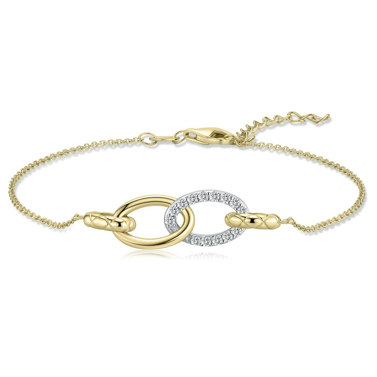 B1056Y-17+3. Gisser goudkleurige armband met twee ovaaltjes en zirkonia. 