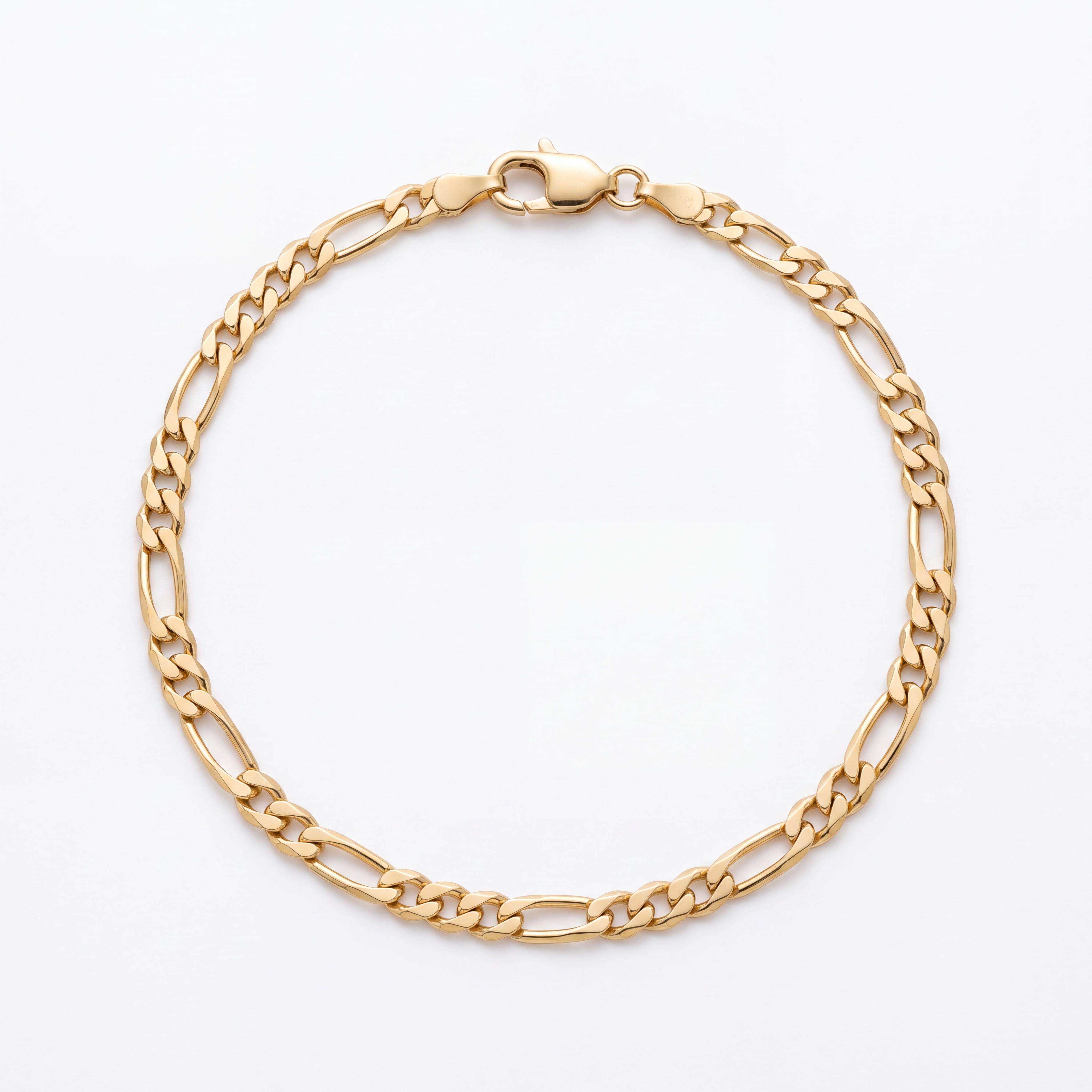 Elegante 14 karaat geelgouden Figaro armband met een uniek 5:1 schakelpatroon (5 korte, 1 lange schakel). Met een lengte van 19 cm en een subtiele breedte van 3,1 mm is dit een tijdloze klassieker voor elke gelegenheid. Bekijk de armband bij Juwelier Rijk aan de Heiligeweg 10 in Amsterdam.