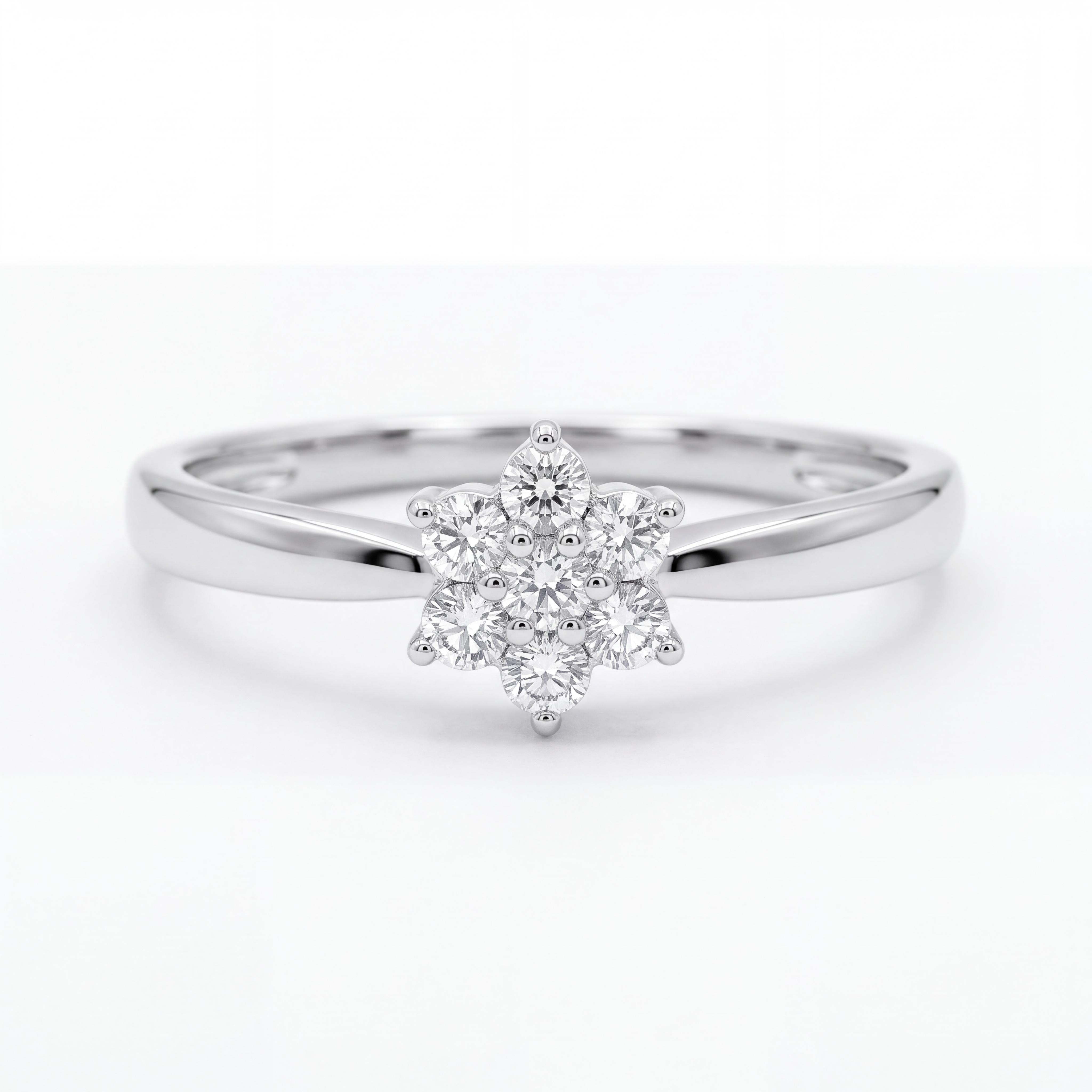 Laat je betoveren door de symbolische schoonheid van deze 14 karaat witgouden bloemring in een verfijnde lotusvorm. In het hart van de ring vormen 7 briljant geslepen diamanten met een totaal gewicht van 0,16 karaat samen een fonkelende lotusbloem. De glanzende witgouden band loopt naar het midden toe subtiel slank af, waardoor het florale motief extra prachtig tot zijn recht komt.   De lotusbloem staat wereldwijd symbool voor zuiverheid, nieuwe beginselen en eeuwige Schoonheid. Dit maakt deze witgouden diamantring niet alleen een optisch spektakel met een indrukwekkende schittering, maar ook een uiterst betekenisvol cadeau voor een bijzondere mijlpaal, jubileum of als unieke verlovingsring.Kom deze elegante lotus ring gerust in het echt bewonderen en passen in onze winkel aan de Heiligeweg 10 in het centrum van Amsterdam. Als ervaren juwelier adviseren wij je graag persoonlijk.