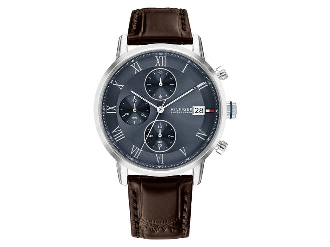 De TH Kane horloge met modelnummer TH1710795 heeft een bruin leren bandje en een blauwe wijzerplaat met Romeinse cijfers. Uitgerust met een quartz uurwerk, analoge tijdsaanwijzing en een metalen kast van 42mm. Perfect voor dagelijks gebruik zonder datumfunctie. Draag hem strak om de pols voor een stijlvolle, klassieke uitstraling. Ideaal voor zowel formele als casual gelegenheden.