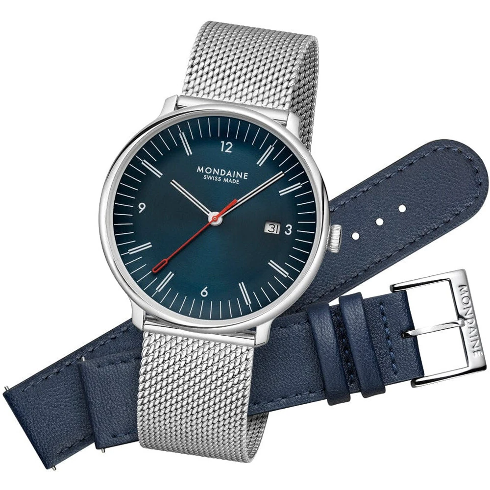 De Mondaine Doppio 41mm leer mesh set blauw MLE41240LQV is een stijlvol horloge met een zilverkleurige wijzerplaat en blauwe leren band. Het horloge heeft een gegevensfunctie, analoge kwartsbeweging, en saffierglas. De roestvrijstalen kast maakt het duurzaam. Draag het voor zowel formele als informele gelegenheden voor een verfijnde uitstraling.