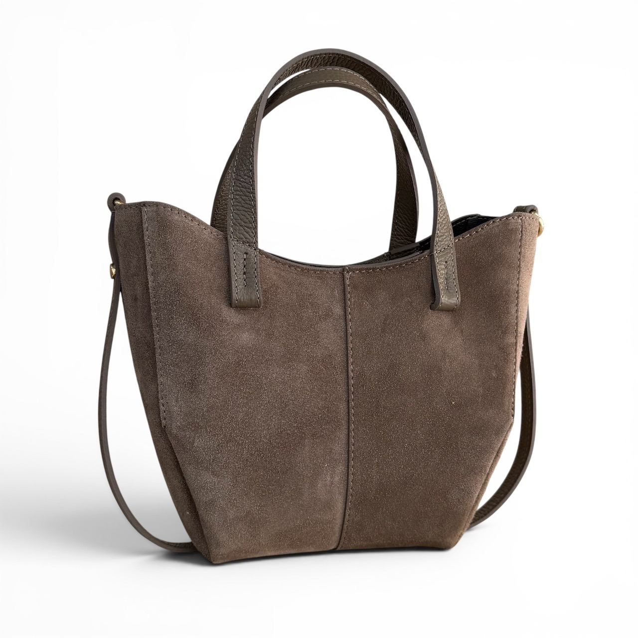 Handtas met afneembare schouderriem en uitneembare binnentasjes
Deze stijlvolle handtas voor dames is compact, praktisch en verrassend veelzijdig. De tas is voorzien van een afneembare schouderriem, waardoor je haar zowel elegant in de hand als comfortabel over de schouder kunt dragen.
De tas sluit aan de bovenzijde met een ritssluiting en biedt voldoende ruimte voor je dagelijkse essentials. Een bijzonder detail zijn de uitneembare binnentasjes, die je eenvoudig uit de handtas kunt halen en ook los als kleine tasjes kunt gebruiken. Zo cre&euml;er je verschillende draagmogelijkheden in &eacute;&eacute;n tas.

Dankzij het compacte formaat is deze handtas ideaal voor dagelijks gebruik, een avondje uit of wanneer je alleen de belangrijkste essentials wilt meenemen.

Productdetails:

Handtas voor dames
Afneembare schouderriem
Bovenrits
Uitneembare binnentasjes
Binnentasjes ook los als tasjes te gebruiken
Compact en veelzijdig model
Afmetingen: 19 cm hoog x 16 cm breed x 10 cm diep
Een praktische en stijlvolle dames handtas met meerdere gebruiksmogelijkheden. Perfect voor wie houdt van een compacte tas die zich gemakkelijk aanpast aan verschillende gelegenheden en outfits.
