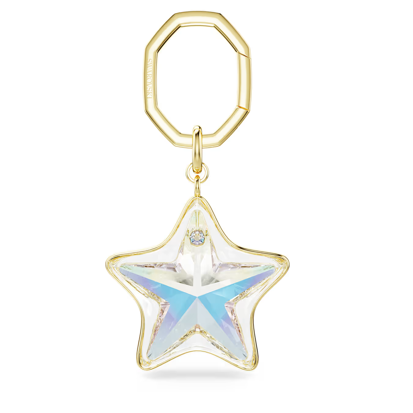 Dit sieraadachtige accessoire uit de Sublima-collectie is ge&iuml;nspireerd op de kosmos. Het is een speelse en luxe manier om tassen, clutches of sleutelbossen te personaliseren. De tashanger is afgewerkt met een glanzende goudkleurige toplaag en is voorzien van een stervormig motief bezet met heldere Swarovski-kristallen in verschillende slijpvormen (mixed cuts). De hanger heeft een totale afmeting van 9,2 x 4,7 cm en sluit met een karakteristieke, achthoekige kliksluiting