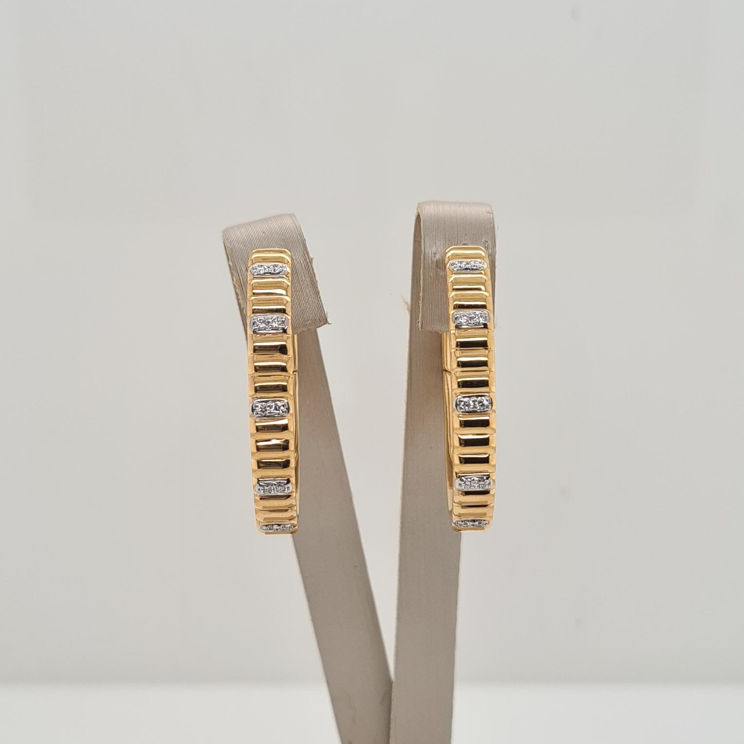 14krt gouden oorsieraden met diamant.