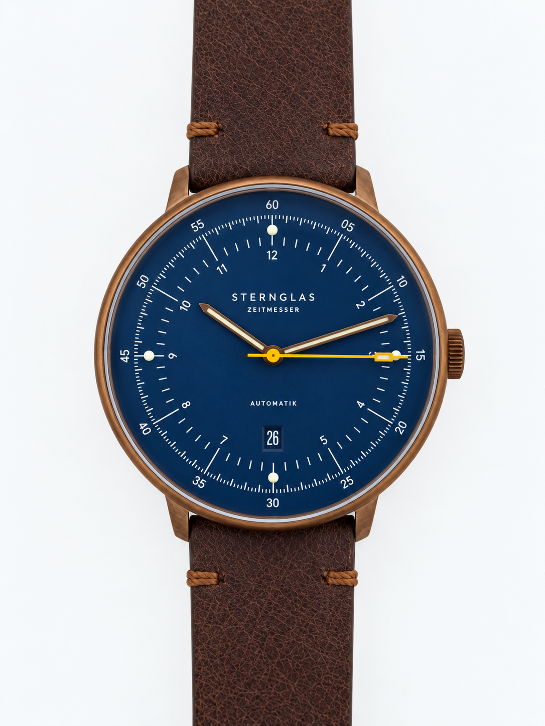 Brons kleurig met blauwe wijzerplaat en bruin leren band. Automaat.