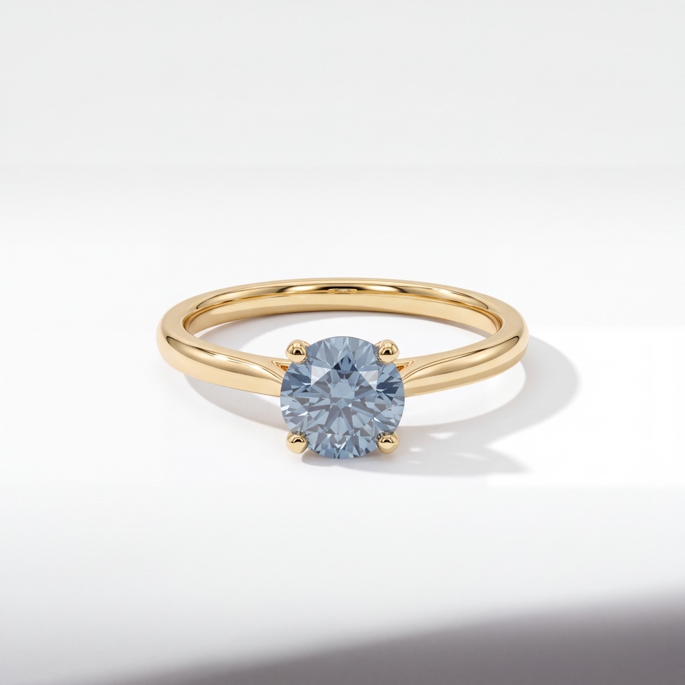 Maak een uniek statement met een blauwe diamantVerras jouw geliefde met iets werkelijk bijzonders van Juwelier Rijk in Amsterdam. Deze verfijnde solitaire verlovingsring straalt pure klasse uit dankzij de zeldzame 1.05 karaat blauwe lab grown diamant met een schitterende ronde slijpvorm. De diamant heeft een helderheid van VS2 en is voorzien van een officieel IGI-certificaat, wat garant staat voor topkwaliteit en echtheid.   