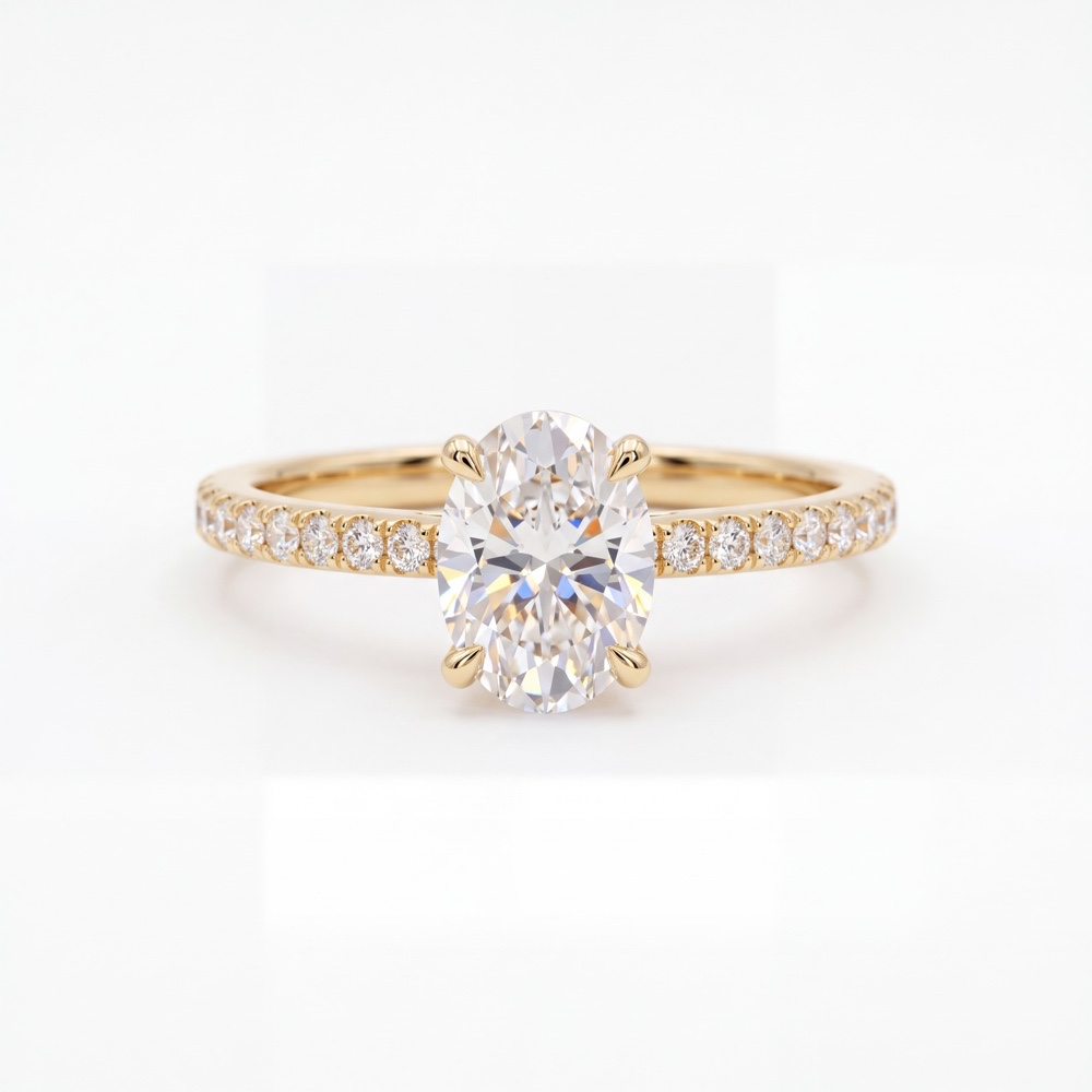 Stralende elegantie met een ovale diamantVerover haar hart met dit meesterwerk van Juwelier Rijk in Amsterdam. Deze verfijnde verlovingsring is ontworpen om ieders blik te vangen. Centraal schittert een prachtige 1.00 karaat lab grown diamant in een elegante ovale slijpvorm. Met een uitzonderlijke zuiverheid van VVS2 en de hoogste kleurklasse D (kleurloos), gecombineerd met een officieel IGI-certificaat, ben je verzekerd van topkwaliteit.   

De ringband is vervaardigd uit massief 18 karaat geelgoud en is bezet met subtiele zijdiamanten van 0.18 karaat in een pav&eacute;-zetting. Dit zorgt voor een schitterende extra fonkeling vanuit elke hoek en geeft de ring een luxe, tijdloze uitstraling.