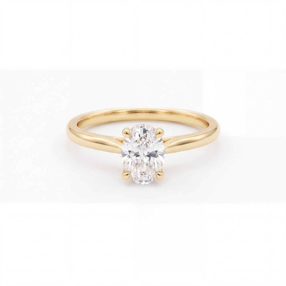 Klassieke elegantie voor het levenBe

zegel jullie liefde met de pure schoonheid van een natuurlijke diamant van Juwelier Rijk in Amsterdam. Deze verfijnde solitaire verlovingsring straalt pure klasse uit dankzij een prachtige 0.70 karaat natuurlijke diamant in een elegante ovale slijpvorm. De diamant heeft een schitterende E-kleur (kleurloos) en een helderheid van VS1, geleverd met een officieel GIA-certificaat.   

De ring is vervaardigd uit massief 18 karaat geelgoud en is ontworpen om een leven lang mee te gaan. Dankzij het doordachte profiel is deze ring bovendien perfect geschikt om een trouwring strak tegen aan te schuiven.