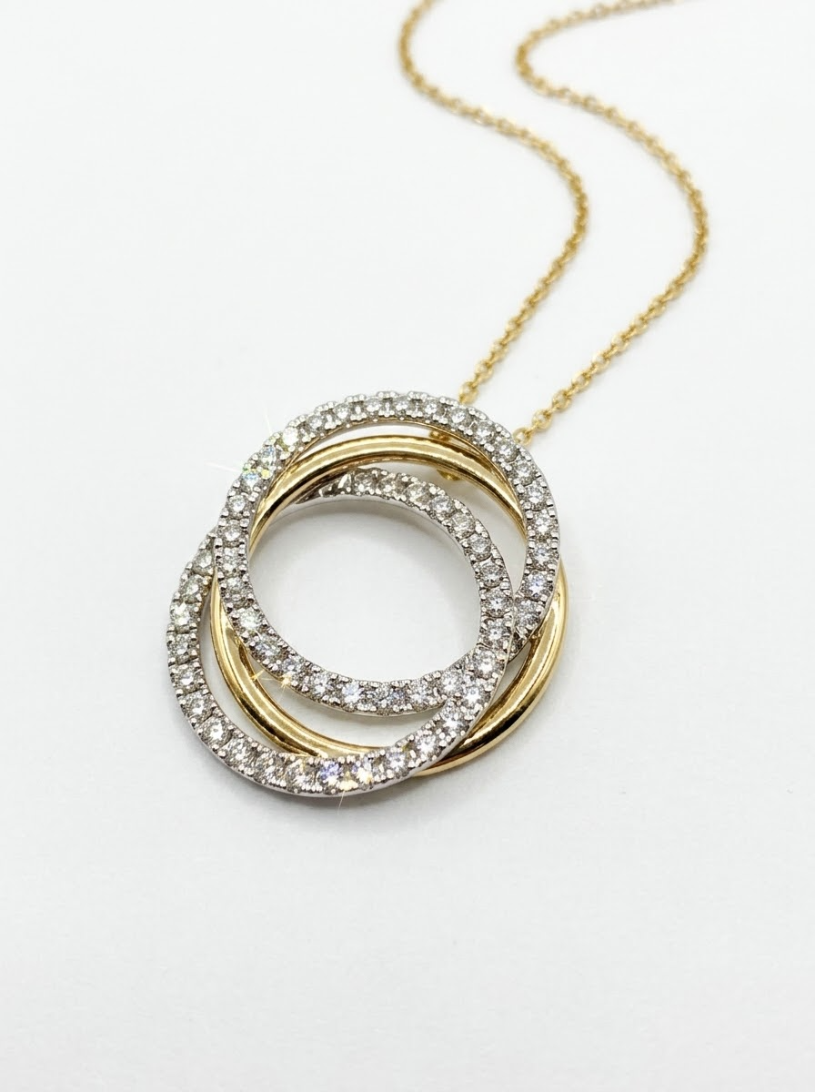 18 karat geel gouden ketting met een 18 karaat bicolor hanger gezet met natuurlijke briljanten 55 x 0.46ct 