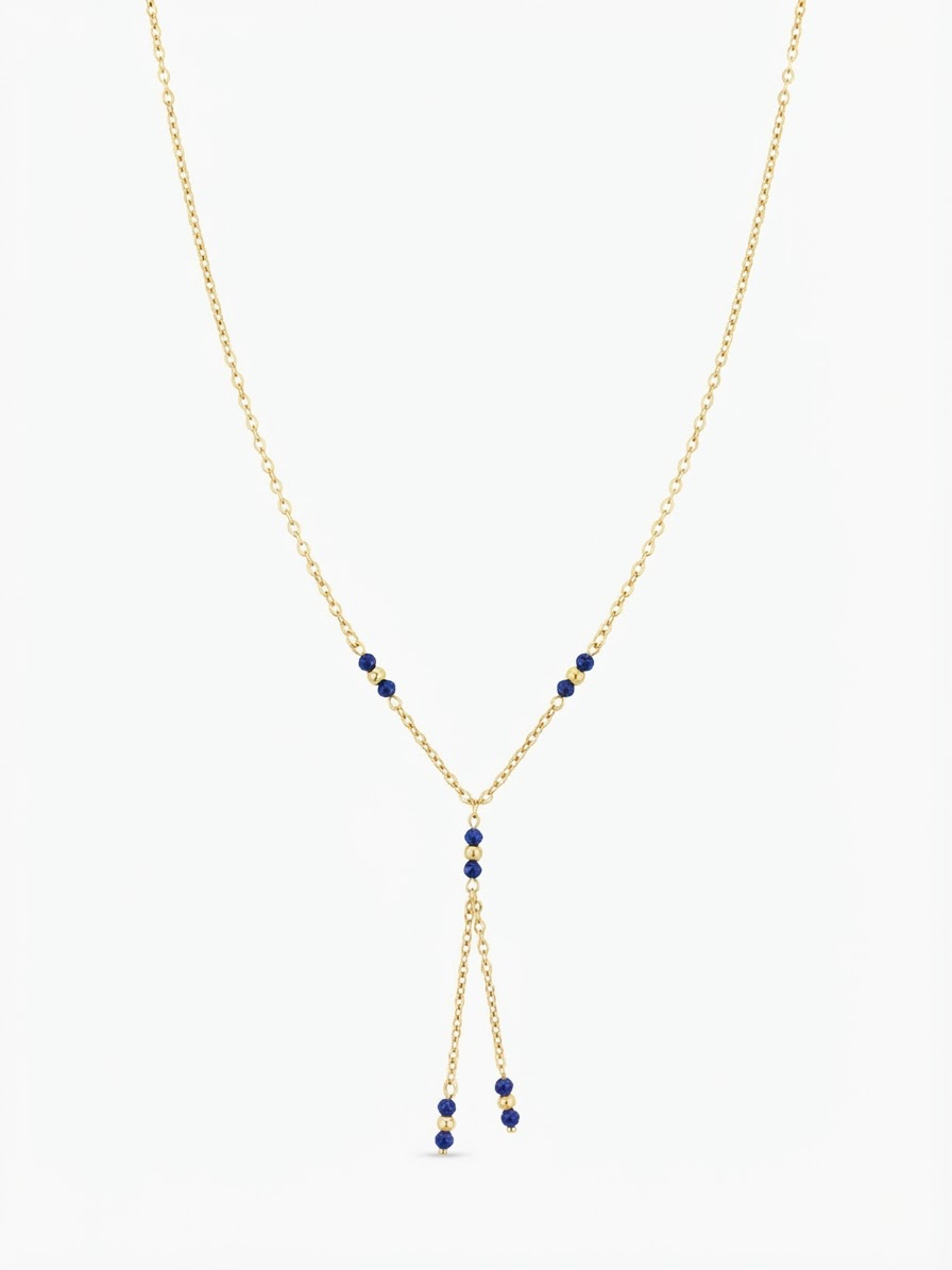 Zilver verguld collier met blauwe balletjes 