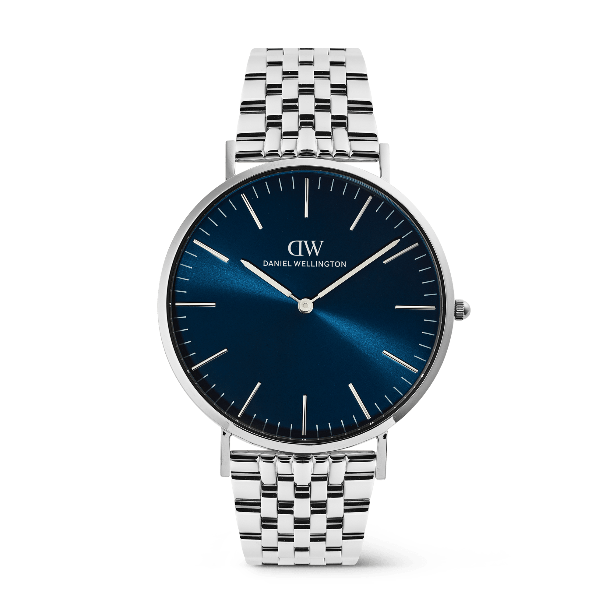 This men's watch from the Classic collection combines a 40 mm silver-tone case with a blue sunray dial and polished seven-link bracelet. The dial's radial finish shifts from deep navy at the edge to a lighter center, creating movement that responds to changing light throughout the day. The seven-link bracelet introduces a structured rhythm that balances the clean dial without adding visual noise. - Recycled stainless steel forms both the case and bracelet, delivering a durable silver-tone structure that resists wear and pairs naturally with other silver accessories. - The blue sunray dial beneath mineral glass uses index pins and slender hands to keep the time display legible, while the radial brushing adds dimension without pattern or texture. - A butterfly buckle provides secure, adjustable fastening, and interchangeable-strap compatibility allows the round case to be styled with leather or fabric when a different look is needed. - Japanese quartz movement ensures reliable everyday timekeeping, while 3 ATM water resistance handles rain and light splashes but is not intended for swimming or submersion. The blue-and-silver combination works as naturally with a suit as it does with a weekend shirt and jeans. When the design relies on proportion and finish rather than decoration, it stays relevant across seasons.