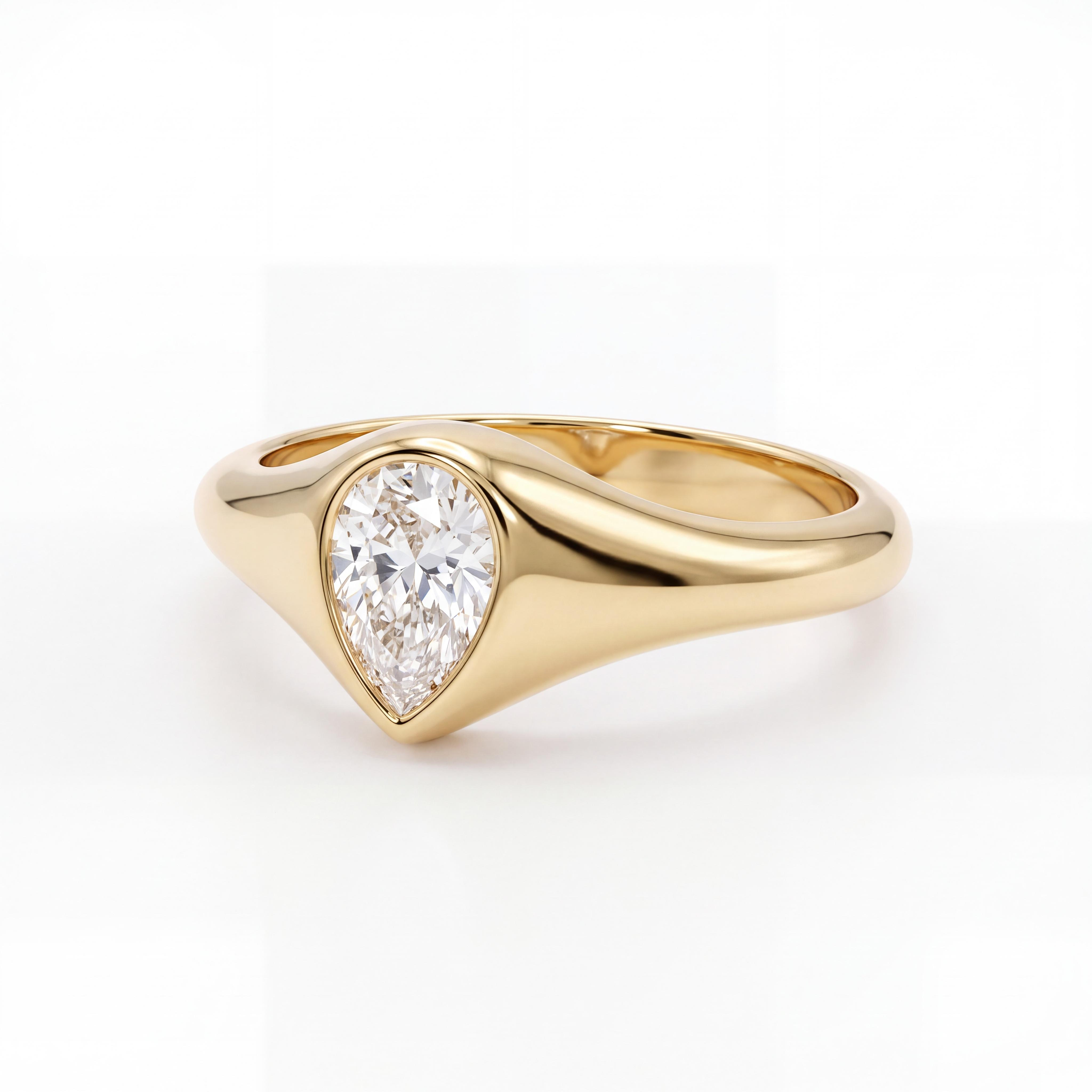 De Gouden Solitare Ring Pear Cut is een elegante en verfijnde ring van 14-karaats goud, briljant afgewerkt met een peervormige zirkonia in een bezel setting. Draag hem solo voor een stijlvolle look.