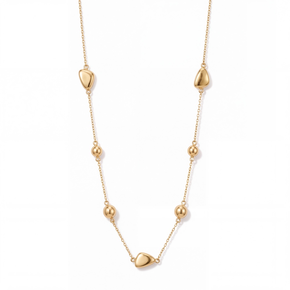 Modern & Elegante Look: 18 Karaat Geelgouden Dames Collier (45 cm / 3 gram)

Voeg een speelse en verfijnde touch toe aan je sieradencollectie met dit prachtige 18 karaat geelgouden dames collier. Dit sieraad combineert een subtiele Schakelketting met een unieke afwisseling van gladde, organisch gevormde gouden bedels en glanzende gouden bolletjes. Het elegante lijnenspel zorgt voor een prachtig lichteffect rond de hals.

Vervaardigd uit hoogwaardig 750 18k geelgoud met een licht en comfortabel gewicht van ca. 3,0 gram. Met een lengte van 45 cm heeft de ketting een ideale klassieke pasvorm die mooi op het sleutelbeen valt. Perfect om los te dragen als een subtiele eyecatcher, of te combineren met andere fijne gouden kettingen.