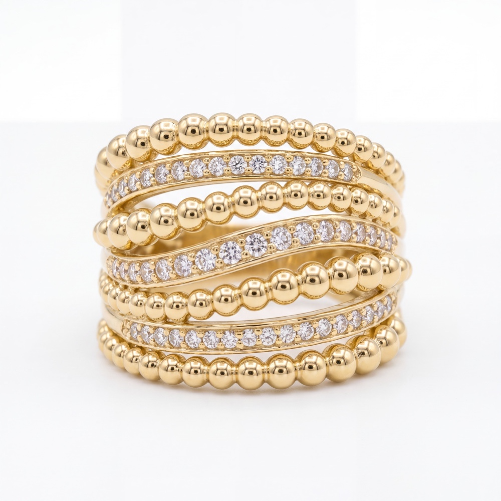 Statement Luxury: Unieke 18 Karaat Geelgouden Stack Ring met Zirkonia (7 gram)

Maak een onuitwisbare indruk met deze adembenemende 18 karaat geelgouden stack ring. Het unieke meerrang ontwerp cre&euml;ert het optische effect van meerdere opgestapelde ringen, waardoor je in &eacute;&eacute;n oogopslag de ultieme ring party om je vinger draagt. De ring combineert speelse banen met bolletjesstructuur (beaded bands) met strakke banen die rijk bezet zijn met glinsterende zirkonia stenen.

Vervaardigd uit hoogwaardig 750 18k geelgoud met een solide en voelbaar gewicht van ca. 7,0 gram. Dit sieraad is een waar statement piece dat luxe, elegantie en modern design moeiteloos samenbrengt.