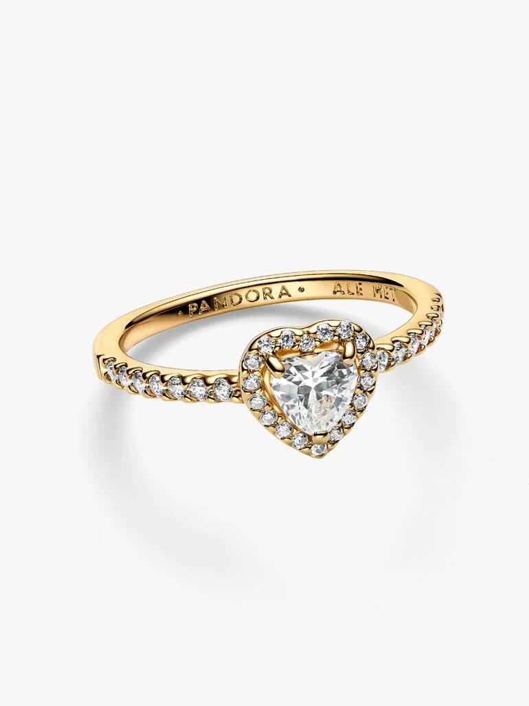 Vertel de wereld dat je gelooft in liefde met onze ring met verhoogd hart. Een hartvormige heldere zirkonia ligt in het midden van de ring, geaccentueerd met sprankelend pav&eacute; in het frame van de zetting en langs de voorkant van de band.