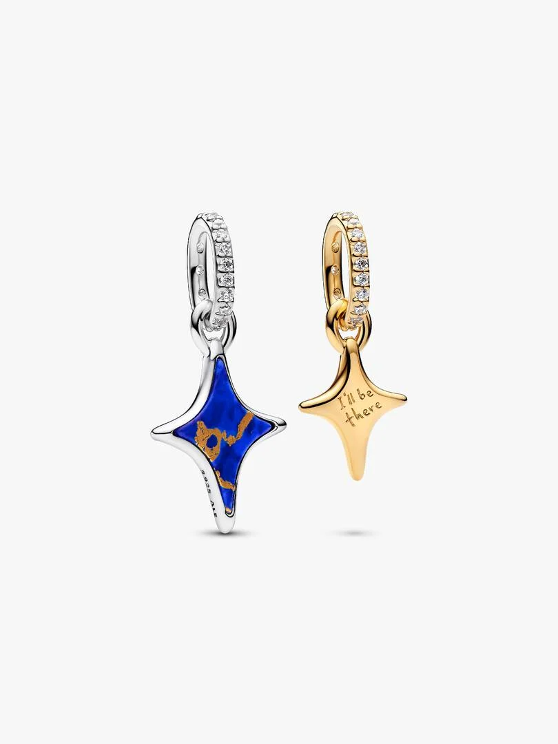 Twee sterren, &eacute;&eacute;n belofte. Deze twee bedels van verschillende metalen combineren imitatielapis lazuli, pav&eacute;-details en de gegraveerde boodschap, 'I'll be there'.