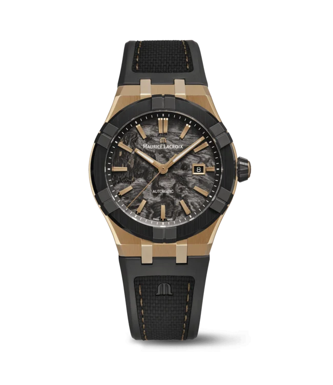 De Maurice Lacroix AIKON-IC Frozen Carbon AC6008-BRL20-730-2 is een exclusief Zwitsers automatisch herenhorloge, gelimiteerd tot slechts 500 exemplaren. De combinatie van brons, zwart keramiek en Frozen Carbon geeft dit model een uitgesproken moderne en technische uitstraling.