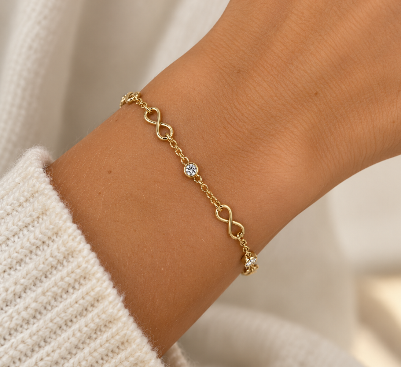 armband 18kt goud infinity en brilj
