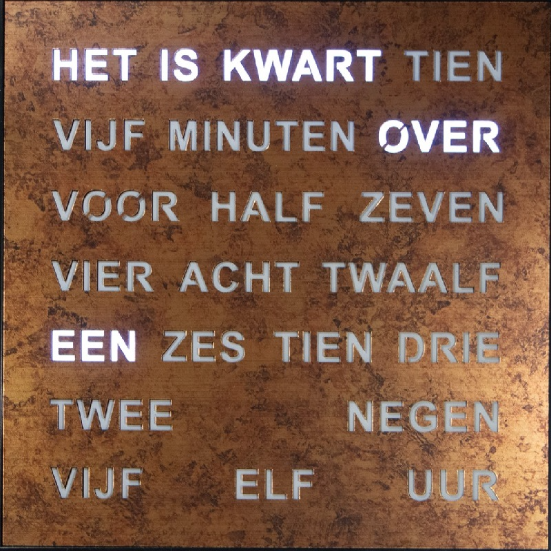 T1243NL is een brons kleurige woordklok. De klok geeft de tijd aan in woorden.
