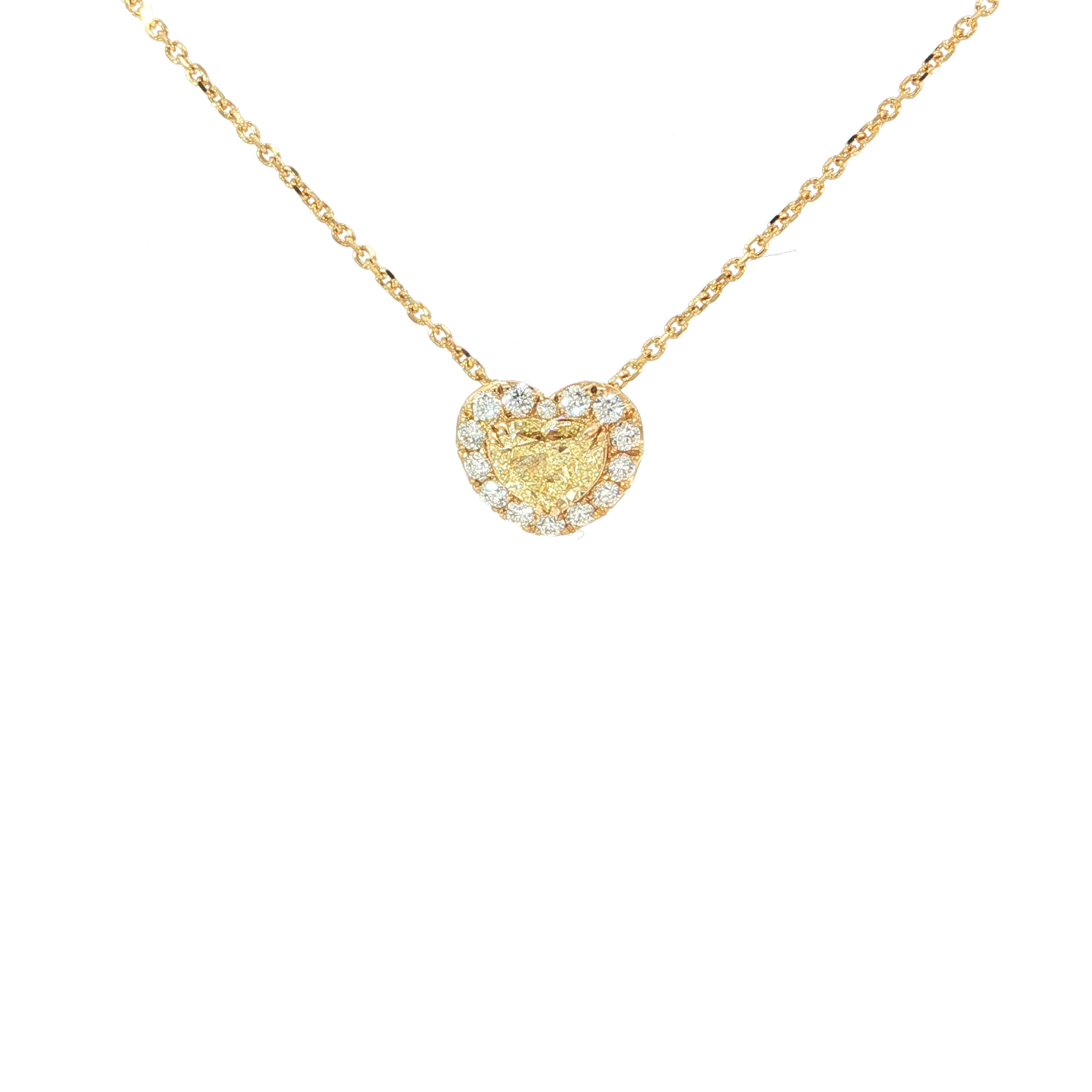Een hart vol schittering, liefde en verfijning! 
Deze romantische halsketting in 18 karaat geelgoud verleidt met een prachtige hartvormige Fancy gele diamant, liefdevol omringd door een fonkelende krans van witte diamanten. Het warme kleurenspel en de sprankelende schittering maken dit juweel tot een bijzondere liefdesverklaring, perfect om iemand die u dierbaar is voor altijd in het hart te dragen.