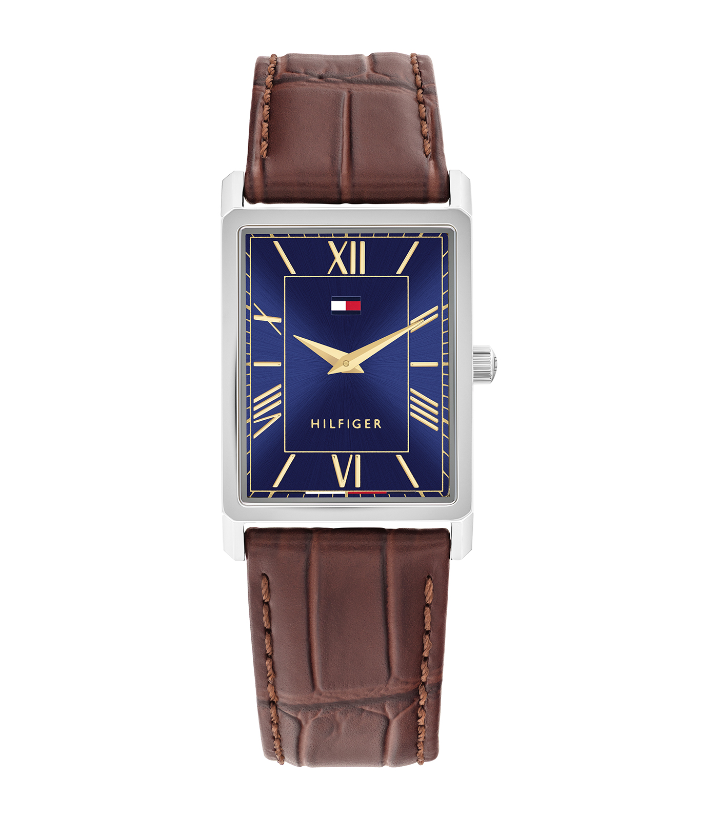 Tommy Hilfiger Heren Horloge Bruin Leder 1710771 is een stijlvol polshorloge met een roestvrijstalen zilverkleurige rechthoekige kast van 40x25.5mm. Het heeft een blauw analoog wijzerplaat met Romeinse indexen. De bruin leren band is 21 mm breed. Ideaal voor formele en casual gelegenheden.