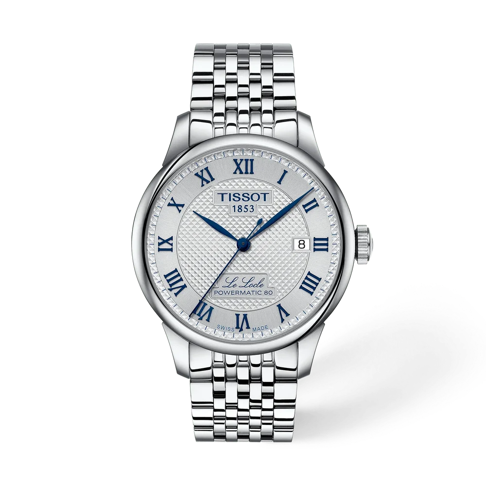 Een eerbetoon aan 20 jaar tijdloze elegantie! Deze bijzondere Tissot Le Locle 20th Anniversary straalt pure Zwitserse klasse uit met zijn verfijnde zilverkleurige wijzerplaat, schitterend guilloch&eacute;patroon en elegante blauwe Romeinse cijfers en wijzers. De prachtig afgewerkte roestvrijstalen kast en vijfdelige schakelarmband geven dit herenhorloge een uitgesproken luxueuze uitstraling.

Het automatische Swiss Made Powermatic 80-uurwerk biedt een indrukwekkende gangreserve van 80 uur, terwijl het krasbestendige saffierglas optimale bescherming garandeert. Als extra troef wordt deze jubileumeditie geleverd met een stijlvolle donkerblauwe lederen horlogeband. Dankzij het praktische quick release-systeem wisselt u eenvoudig tussen beide banden, zonder gereedschap.

Een exclusief jubileumhorloge dat Zwitserse horlogetraditie, verfijnde details en veelzijdige elegantie perfect verenigt.